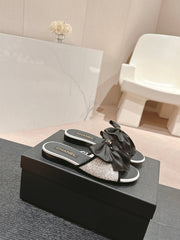 BOW LADY SLIPPERS BLACK LAMBSKIN WITH WHITE RHINESTONES