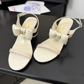 MID HEEL SANDALS IN WHITE CALFSKIN WITH BOW