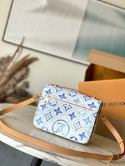 POCHETTE MÉTIS 25 IN LAGOON BLUE MONOGRAM TILES CANVAS GOLD HARDWARE