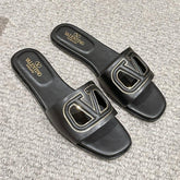 VLOGO CUT-OUT BLACK CALFSKIN SLIDE SANDAL
