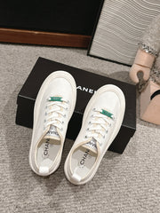 LACE-UP SNEAKERS IN WHITE CANVAS