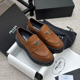 PRADA 25S LOAFER 50MM IN BURNT ORANGE CALFSKIN LOGO