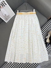 WHITE FLARED SKIRT WITH PRINT