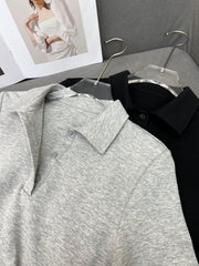 FITTED POLO SHIRT WITH PLEATED WAIST