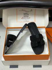 HM 25S ORAN SANDAL IN BLACK LAMBSKIN WITH STONE DETAILS