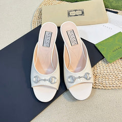 GG Women's Horsebit mid-heel slide sandal in glossy White leather