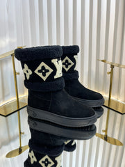 SNOWDROP FLAT ANKLE BOOTS IN BLACK SUEDE