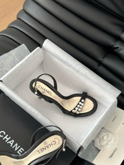 PEARL SANDAL IN BLACK AND GOLD LAMBSKIN 75 MM