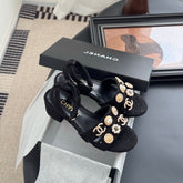 HIGH SANDALS IN BLACK TWEED WITH LOGO STICKER DETAIL