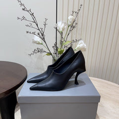 CURVED HEEL DEEP MOUTH PUMPS IN BLACK CALFSKIN