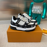 LV TRAINER MAXI SNEAKER IN WHITE MIX BLACK CALFSKIN