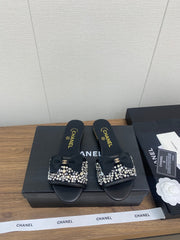 BOW SLIPPERS IN BLACK LAMBSKIN WITH RHINESTONES