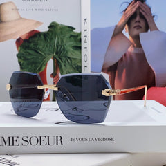 PANTHÈRE RIMLESS GEOMETRIC FRAME SUNGLASSES 562061 IN METAL