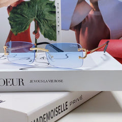 C DE RECTANGULAR RIMLESS FRAME SUNGLASSES 575769 IN METAL