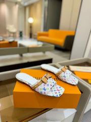 LV X TM 6AM FLAT MULE IN WHITE MONOGRAM CALFSKIN