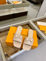 LV X TM 6AM FLAT MULE IN LINEN TAN CALFSKIN