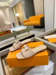 LV X TM 6AM FLAT MULE IN LINEN TAN CALFSKIN