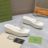 HIGH WEDGE PLATFORM IN WHITE GLOSSY CALFSKIN WITH DOUBLE CRYSTAL G BUCKLE