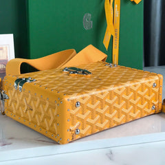 CASSETTE TRUNK BAG 21 IN YELLOW GOYARDINE CANVAS & CLAMECY COWHIDE