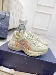 GG RHYTON TRAINER WHITE LAMBSKIN WITH FIRE MOTIF