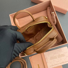 MICRO BAG KEYCHAIN 11 IN CAPE PALLISER BROWN CALFSKIN EMBOSSED LOGO