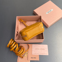 MICRO BAG KEYCHAIN 11 IN INDOCHINE ORANGE CALFSKIN EMBOSSED LOGO