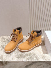CELINE 25S MARTIN BOOTS IN MEDIUM ORANGE CALFSKIN