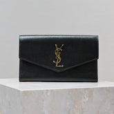 UPTOWN WALLET 21 IN BLACK CALFSKIN GOLD LOGO