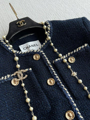 CHANEL SHORT-SLEEVE WOOL JACKET STYLE 29