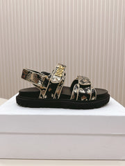 DIOR BACK-STRAP SANDALS 25S IN BLACK AND GOLD CALFSKIN WITH BUTTERFLY MOTIF