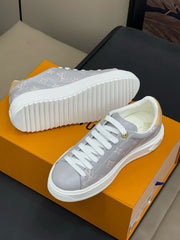 TIME OUT SNEAKER IN COOL GRAY EMBOSSED MONOGRAM CALFSKIN