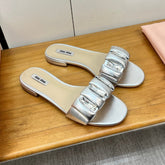 FLAT SLIDE IN SILVER CALFSKIN