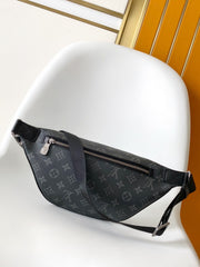 LV 25S DISCOVERY BUMBAG 44 IN BLACK NEON JADE MONOGRAM ECLIPSE CANVAS AND CALFSKIN