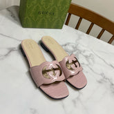 GG SLIDES IN PASTEL PINK CALFSKIN LOGO-EMBOSSED STRAP