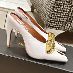 ALAIA SPIKE JEWEL MULES IN WHITE CALFSKIN WITH GOLD HARDWARE