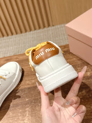 MM SNEAKERS IN WHITE CALFSKIN WITH YELLOW LACES