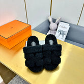 CHYPRE SANDAL IN BLACK SHEARLING