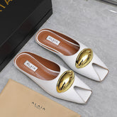 ALAIA FLAT MULE IN WHITE LAMBSKIN WITH GOLD HARDWARE