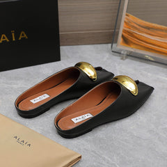 ALAIA FLAT MULE IN BLACK LAMBSKIN WITH GOLD HARDWARE
