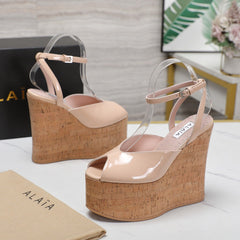 ALAIA WEDGE SANDAL IN BEIGE TAN GLOSSY CALFSKIN AND BEIGE RUBBER