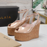 ALAIA WEDGE SANDAL IN BEIGE TAN GLOSSY CALFSKIN AND BEIGE RUBBER