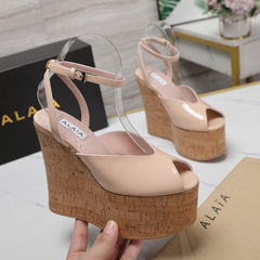 ALAIA WEDGE SANDAL IN BEIGE TAN GLOSSY CALFSKIN AND BEIGE RUBBER