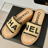 THICK SOLE LETTER SLIPPERS IN DARK CREAM SHEEPSKIN