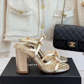 HIGH HEELS SANDAL IN GOLD LAMBSKIN PEARL FLOWERS