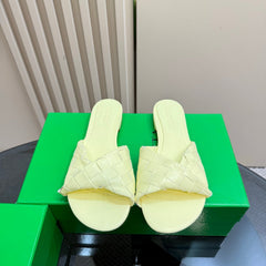 BLINK FLAT MULE IN PASTEL YELLOW INTRECCIATO LEATHER