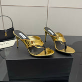 ALAIA HEELED THONG 25S IN GOLD PATENT LEATHER