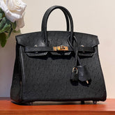 KELLY SELLIER 25 BAG IN BLACK OSTRICH LEATHER WITH GOLD HARDWARE