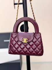 CHANEL 25S KELLY 19 CM IN WINE RED LAMBSKIN WITH GOLD HARDWARE