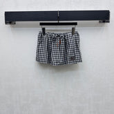 MIU 25S PLAID MINI SKIRT WITH DRAWSTRING 264707