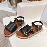 FLAT SANDALS IN BLACK TRIOMPHE EMBOSSED SMOOTH CALFSKIN